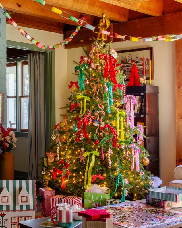 Colorful ribbon on a Christmas tree in a living room