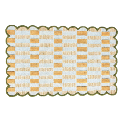 Yellow rug with scallop edges from Anthropologie