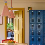 Dining room showing pink pendants and a blue locker