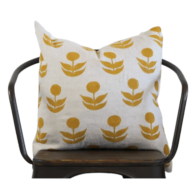 patterned pillow by Muse Textiles on a chair